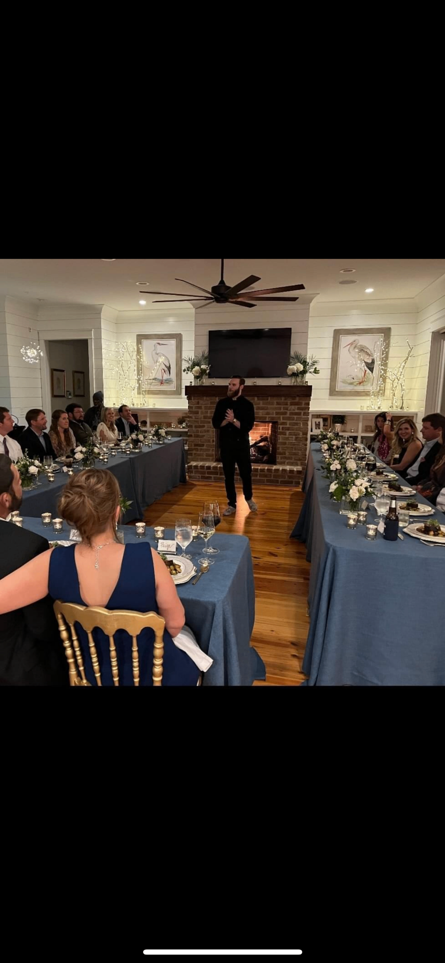 Chef Kurt Hall introducing the evening's menu to guests at a private dining table